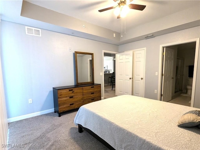 9005 Colby Dr Unit 1903, Fort Myers, FL 33919 - bedroom featuring connected bathroom, baseboards, visible vents, and carpet