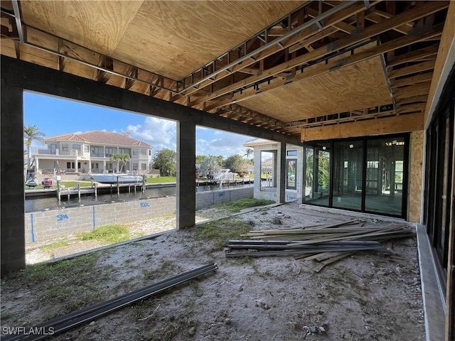 view of patio with a water view