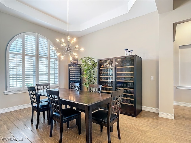 dining area featuring plenty of natural light and light hardwood / wood-style floors