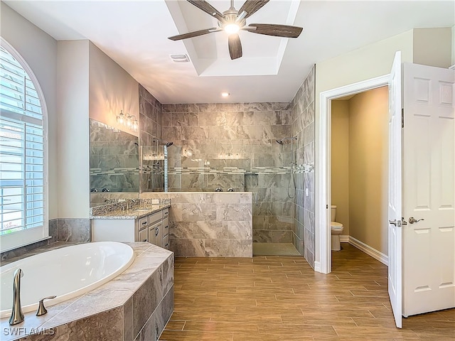 full bathroom with plenty of natural light, wood-type flooring, and toilet