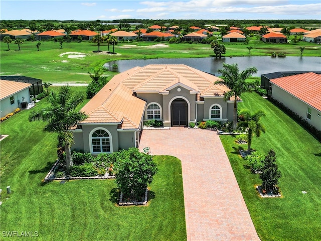 view of front of property with a water view