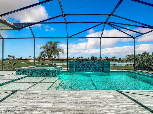 view of pool featuring pool water feature and a lanai