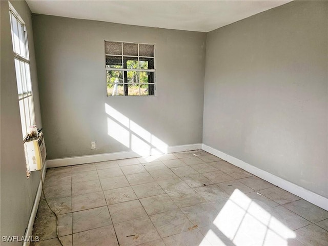 12474 Poem Ave, Punta Gorda, FL 33955 - tiled spare room featuring healthy amount of natural light