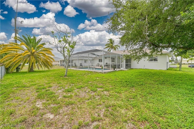 view of yard featuring a lanai