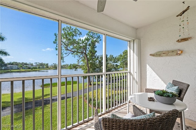 sunroom with a water view