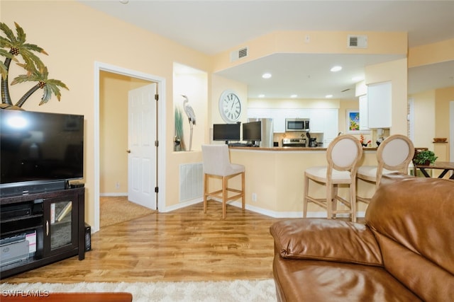 living room featuring light wood-type flooring