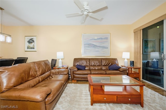 living room featuring ceiling fan