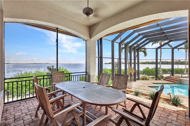 sunroom with a water view