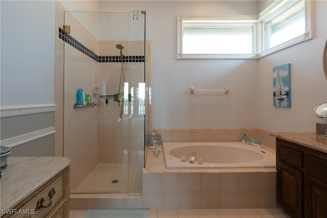 bathroom featuring vanity, separate shower and tub, and tile patterned flooring