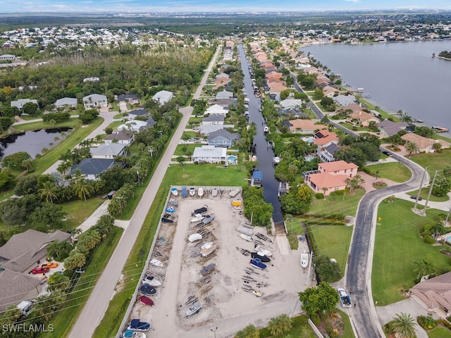 bird's eye view with a water view