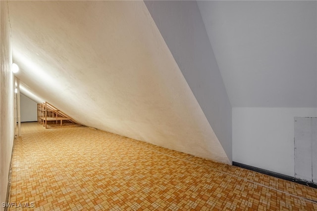 bonus room with lofted ceiling