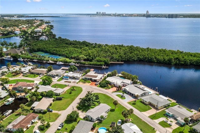 bird's eye view with a water view