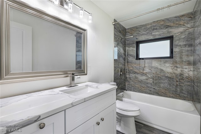1703 Marina Ter, North Fort Myers, FL 33903 - bathroom with shower / bathtub combination, vanity, toilet, and wood finished floors