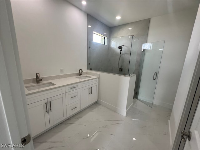 bathroom with vanity and an enclosed shower