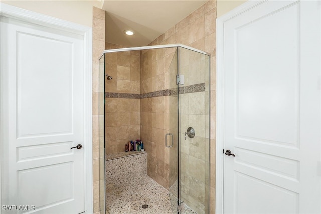 16649 Toscana Cir Unit 803, Naples, FL 34110 - full bathroom with a stall shower and recessed lighting