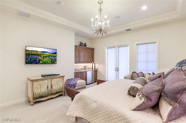 16649 Toscana Cir Unit 803, Naples, FL 34110 - bedroom with ornamental molding, a chandelier, a raised ceiling, light colored carpet, and recessed lighting