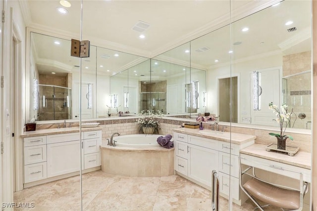 16649 Toscana Cir Unit 803, Naples, FL 34110 - bathroom with ornamental molding, a garden tub, two vanities, a stall shower, and recessed lighting
