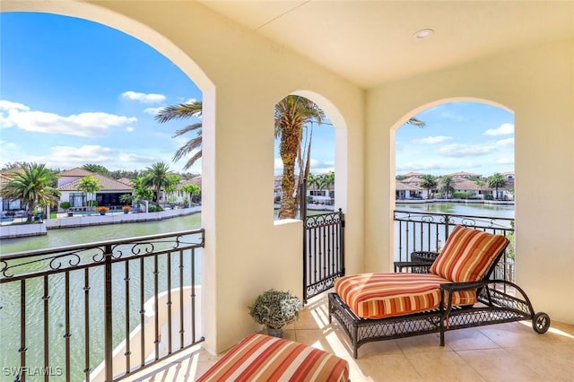 16649 Toscana Cir Unit 803, Naples, FL 34110 - balcony featuring a water view