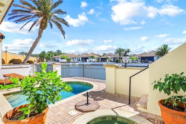 16649 Toscana Cir Unit 803, Naples, FL 34110 - view of pool with a jacuzzi, a residential view, and a patio area