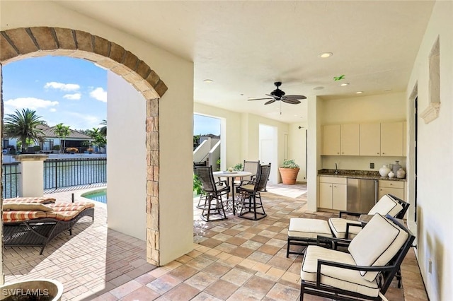 16649 Toscana Cir Unit 803, Naples, FL 34110 - view of patio with ceiling fan and outdoor dining space
