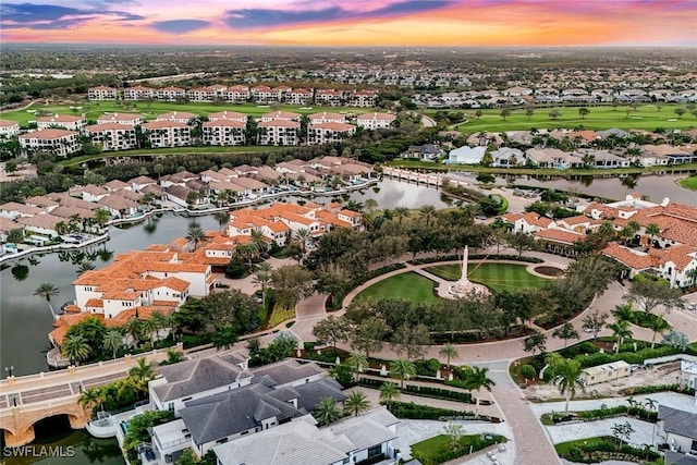 16649 Toscana Cir Unit 803, Naples, FL 34110 - aerial view at dusk of a water view and a residential view
