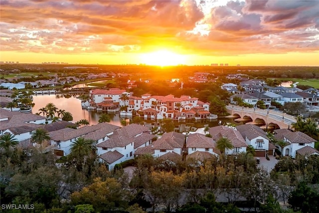 16649 Toscana Cir Unit 803, Naples, FL 34110 - aerial perspective of suburban area featuring a large body of water