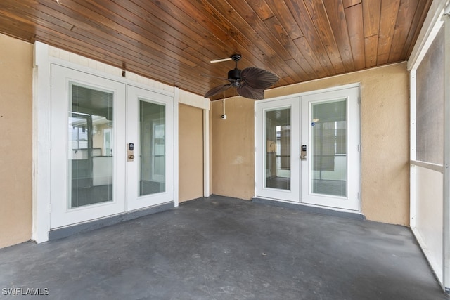 view of patio featuring french doors and ceiling fan