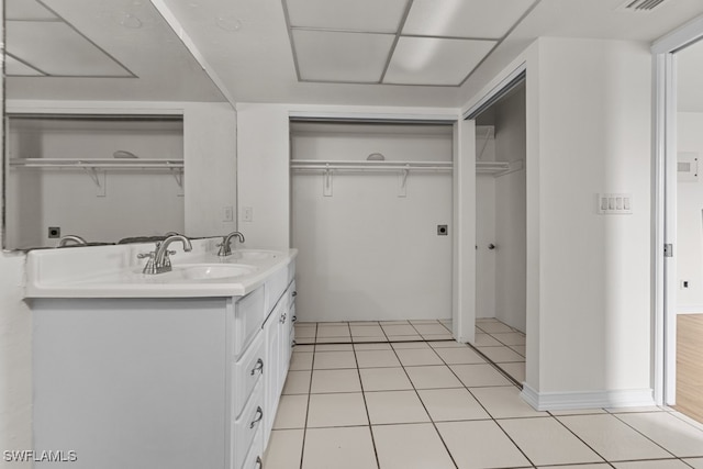 bathroom featuring vanity and tile patterned flooring