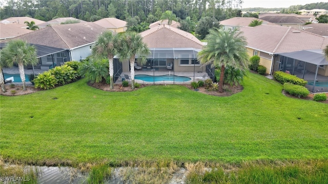 exterior space featuring an outdoor pool, a lanai, and a patio
