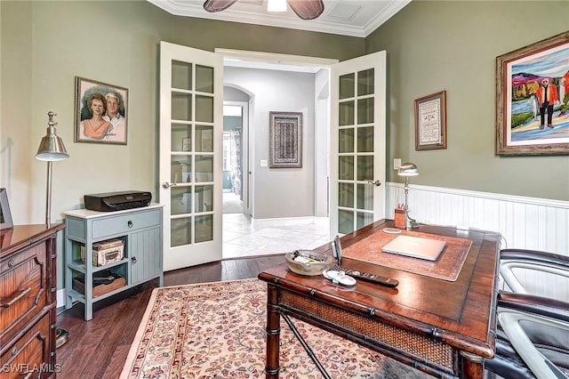 office space featuring ceiling fan, ornamental molding, dark wood-type flooring, and french doors