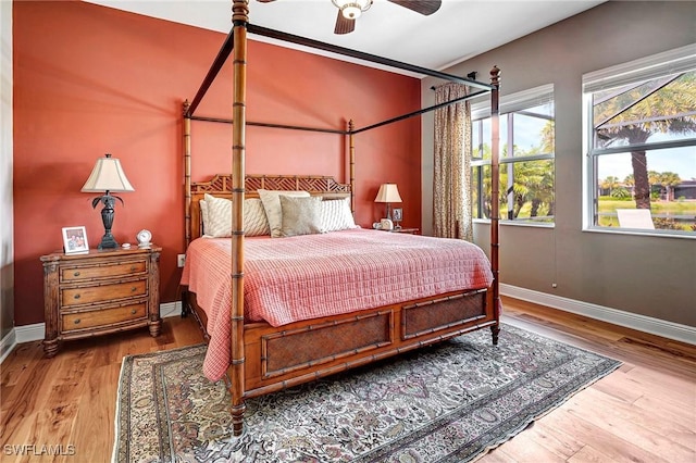 bedroom featuring hardwood / wood-style flooring and ceiling fan