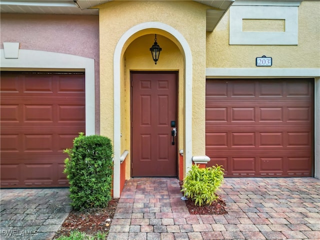 entrance to property with a garage