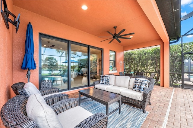 view of patio with an outdoor hangout area and ceiling fan