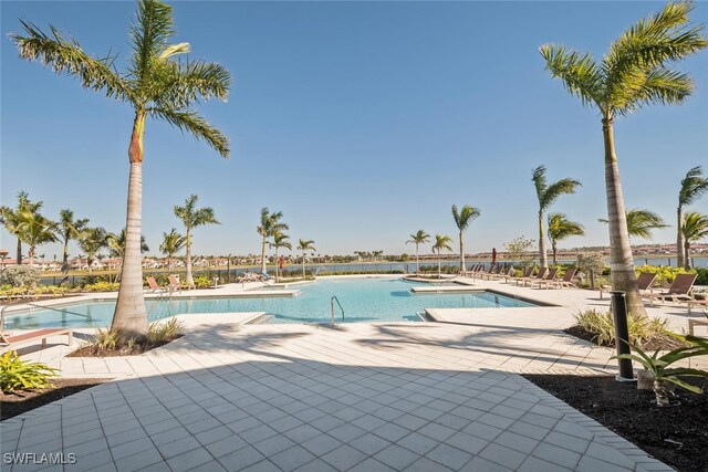 view of pool featuring a hot tub