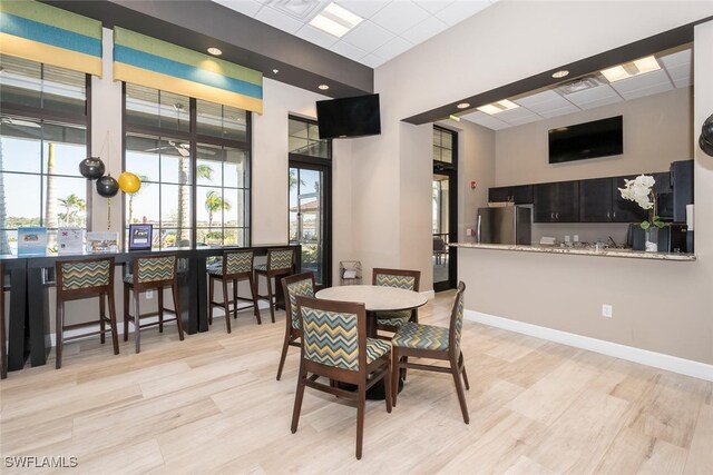 dining room featuring a high ceiling