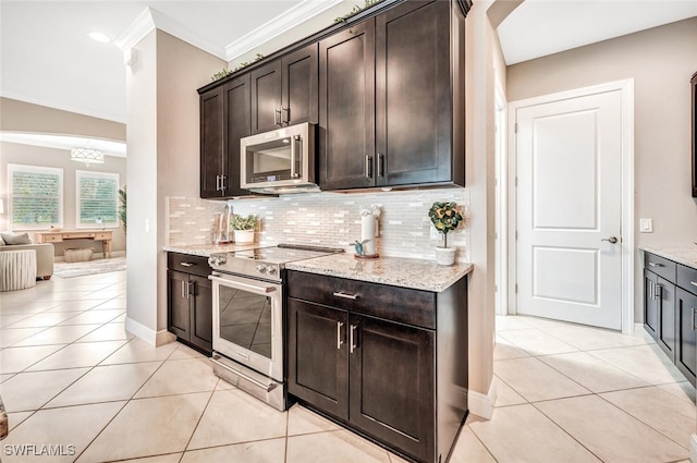 kitchen featuring stainless steel appliances, light tile patterned flooring, light stone counters, and dark brown cabinetry