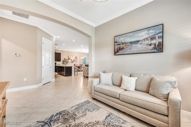 tiled living room with crown molding