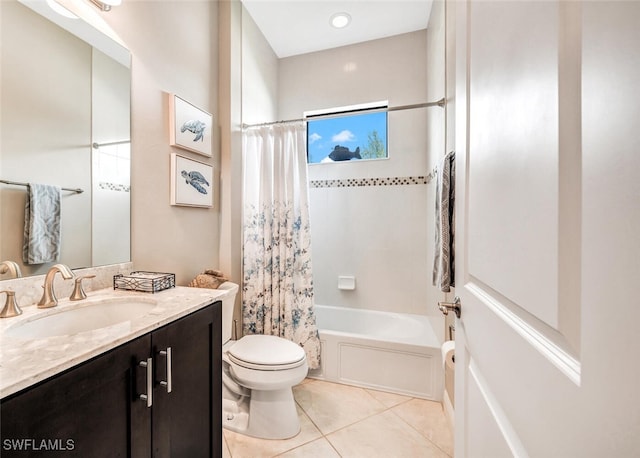 full bathroom featuring tile patterned flooring, shower / bath combo, vanity, and toilet