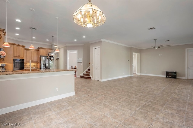 unfurnished living room with sink, light tile patterned floors, ceiling fan with notable chandelier, and ornamental molding