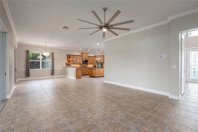 unfurnished living room with ornamental molding, ceiling fan with notable chandelier, light tile patterned floors, and a healthy amount of sunlight