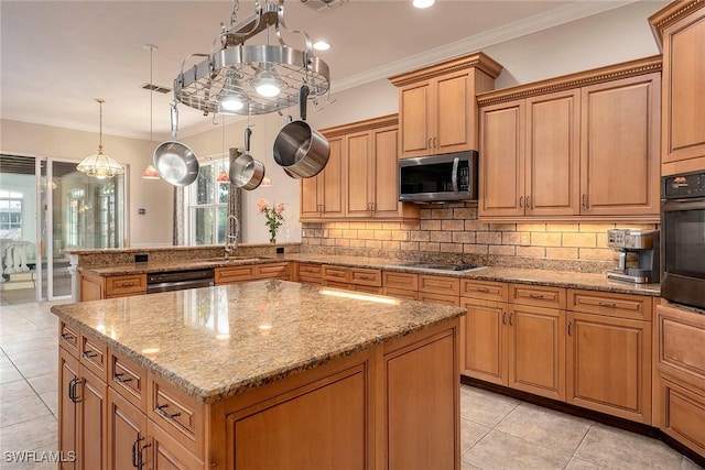 kitchen with a sink, backsplash, light stone countertops, black appliances, and crown molding