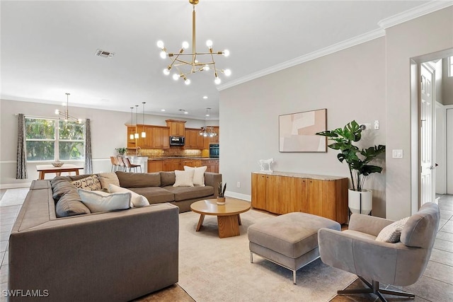 living area with a chandelier, baseboards, visible vents, and crown molding