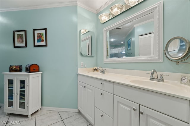 1010 Partridge Cir Unit 202, Naples, FL 34104 - full bathroom featuring crown molding, baseboards, double vanity, and tile patterned flooring