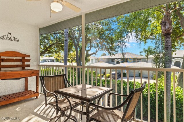1010 Partridge Cir Unit 202, Naples, FL 34104 - balcony featuring a ceiling fan
