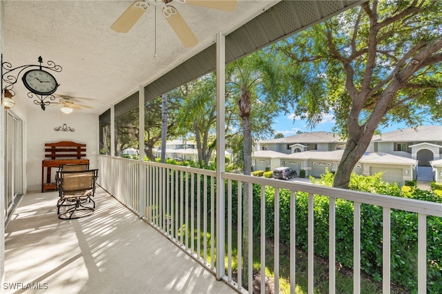 1010 Partridge Cir Unit 202, Naples, FL 34104 - balcony featuring ceiling fan and a residential view