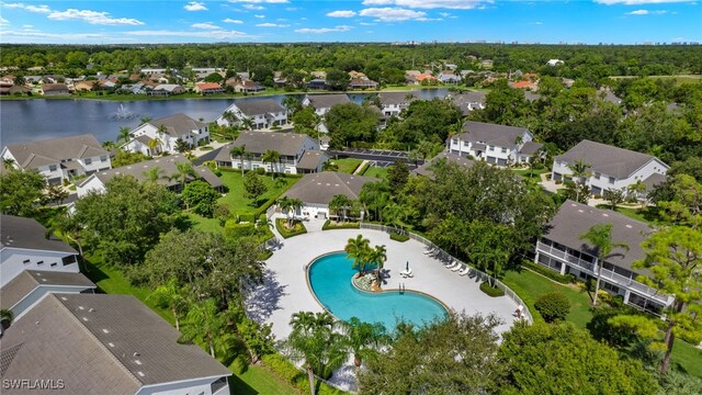 1010 Partridge Cir Unit 202, Naples, FL 34104 - aerial perspective of suburban area featuring a nearby body of water and a pool area