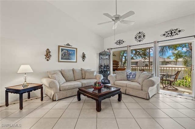 living room with high vaulted ceiling, light tile patterned flooring, and ceiling fan