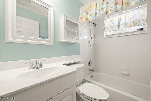 1010 Partridge Cir Unit 202, Naples, FL 34104 - bathroom featuring vanity, toilet, and washtub / shower combination