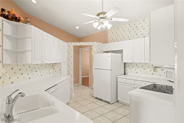 1010 Partridge Cir Unit 202, Naples, FL 34104 - kitchen with white appliances, wallpapered walls, a sink, ceiling fan, and light tile patterned floors