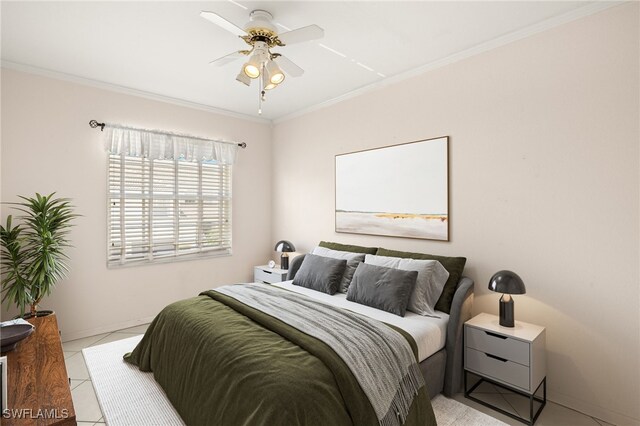 1010 Partridge Cir Unit 202, Naples, FL 34104 - bedroom with light tile patterned flooring, ornamental molding, ceiling fan, and baseboards